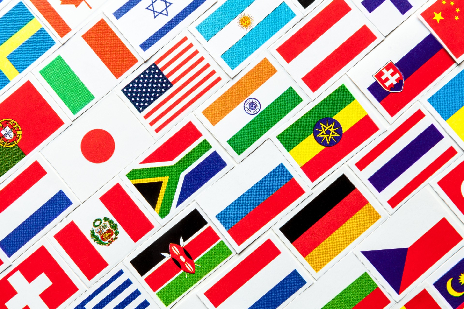 Arrière-plan de différents drapeaux nationaux colorés du monde. collage